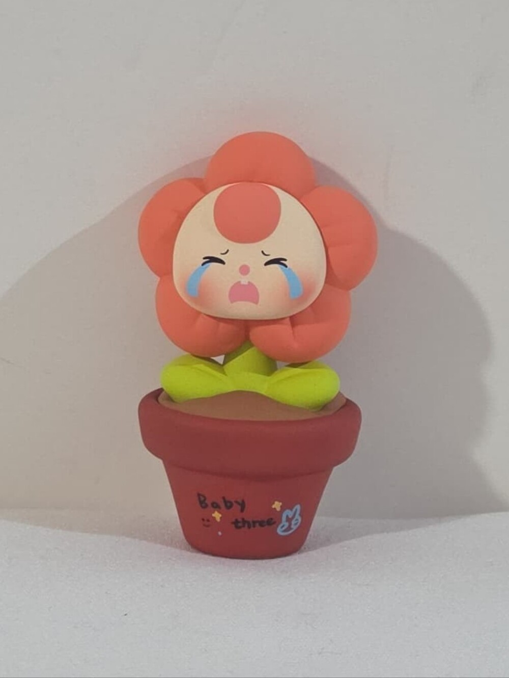 Baby Three crying flower mini figure